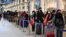 People at St Pancras station in London, waiting to board the last train to Paris amid concerns that borders will close.
